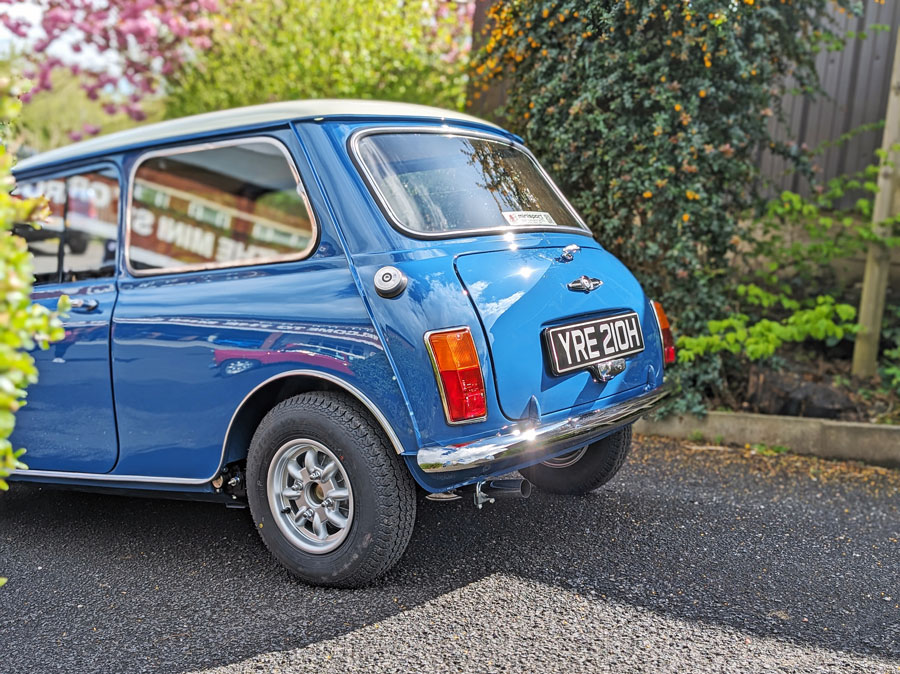 Rear of the Mk2 Mini cooper, fully restored in Island Blue with a snowberry roof.